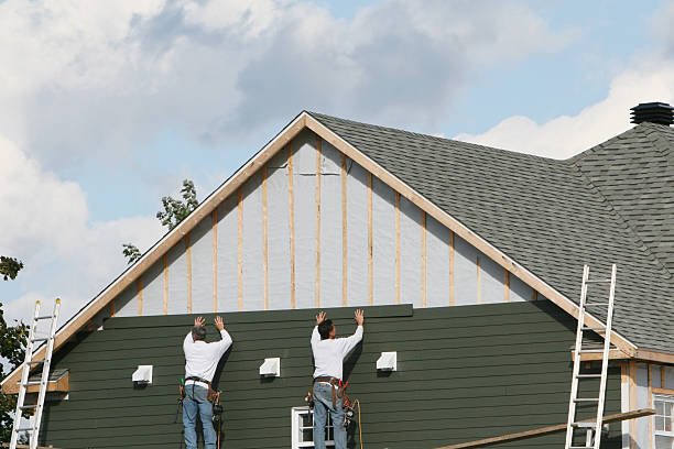 Professional Siding Replacement technician working in Norwood, NY